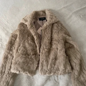 Vila fur coat - Vila's unused fur coat, size S, tags still attached. Original price €94.95. https://www.vinted.fi/items/7185031075-vila-fur-coat
