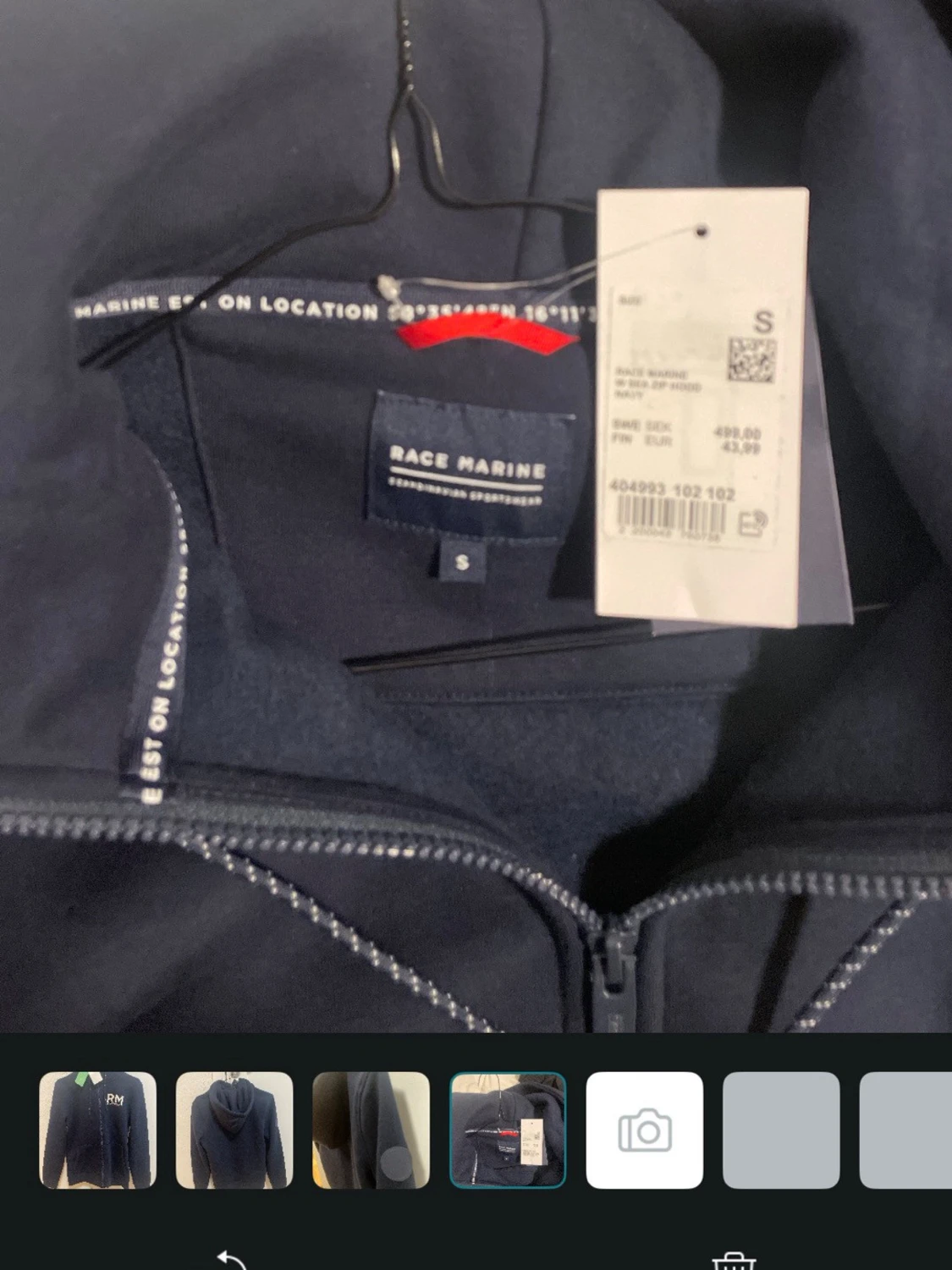 Mörkblå zip hoodie från Peak Performance - 3