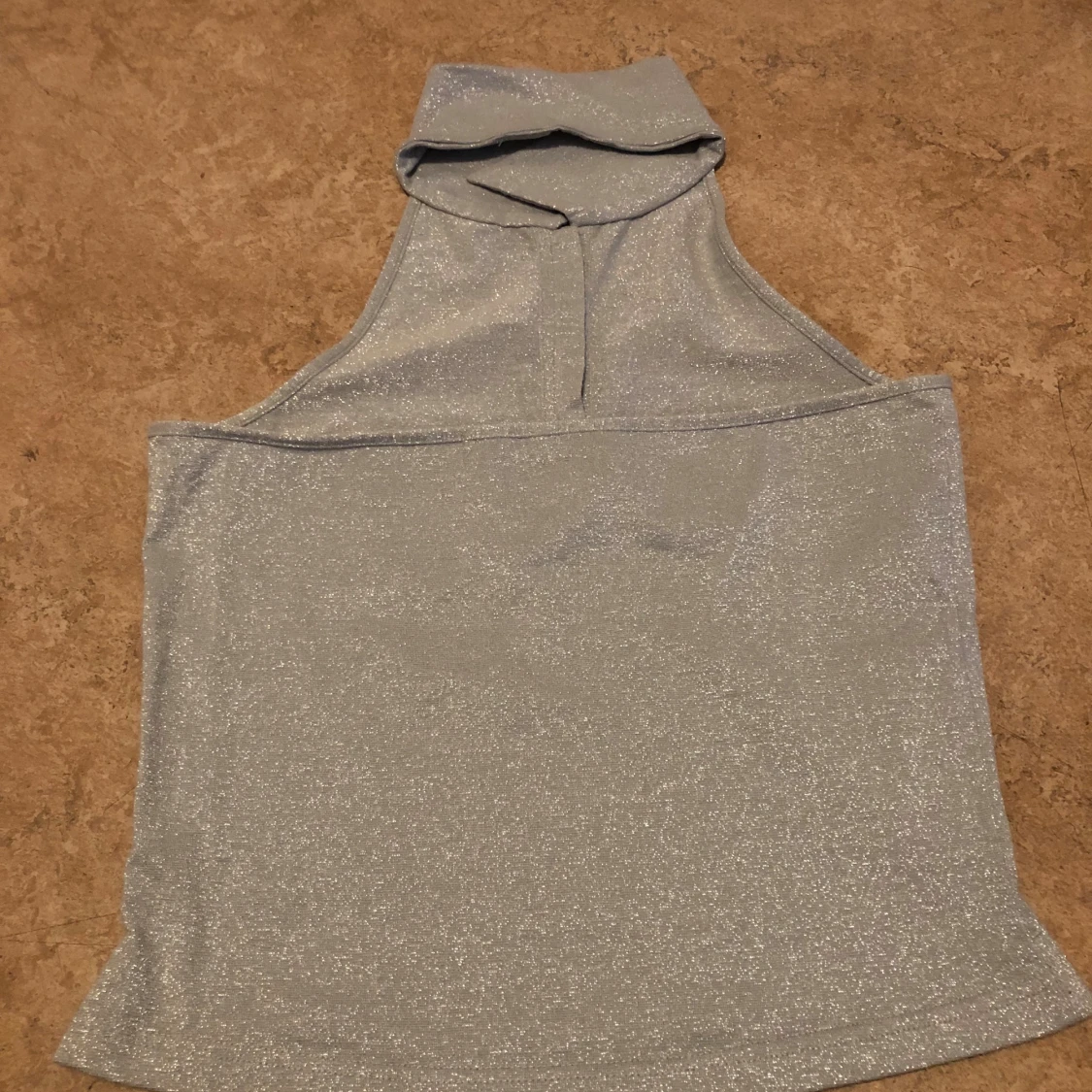 Glittrig silver polotopp