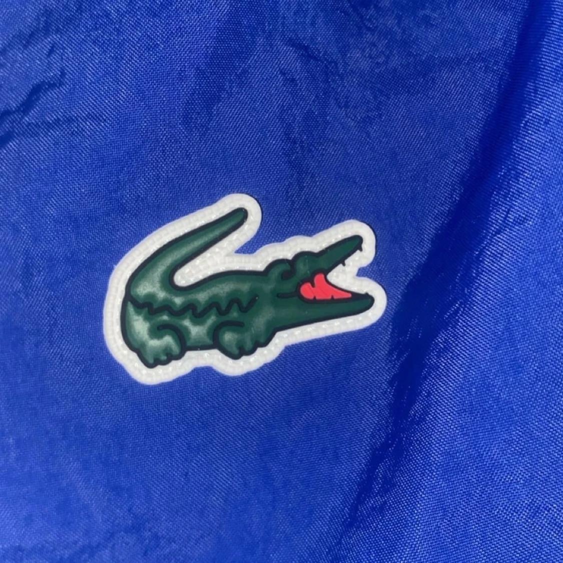 Blå täckbyxor från Lacoste Sport - 1