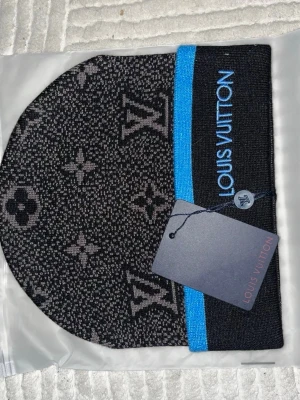 Svart L mössa - Svart L mössa bra pris