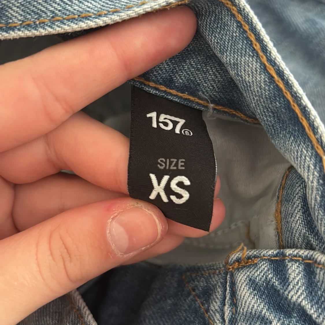 Blå jeansshorts med slitningar XS - 1