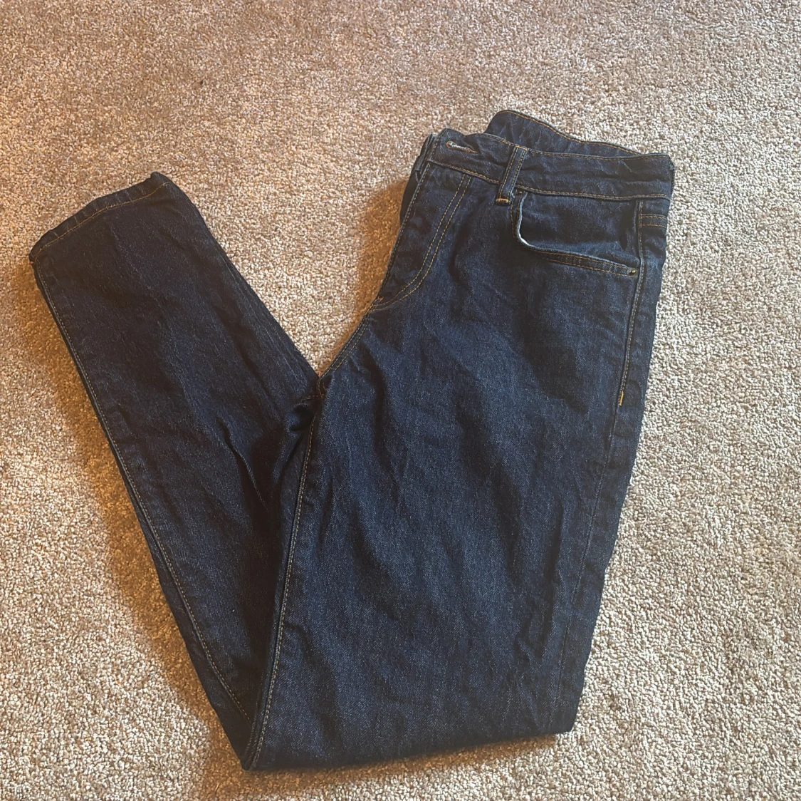 Mörkblå jeans från John Henric W31