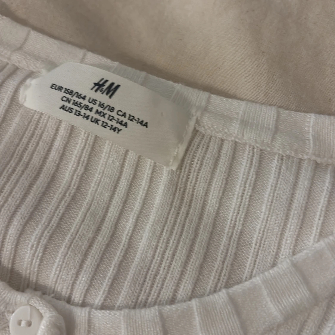 Vit ribbad kofta från H&M - 1