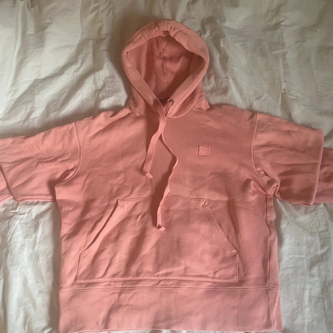 Rosa hoodie från Acne Studios