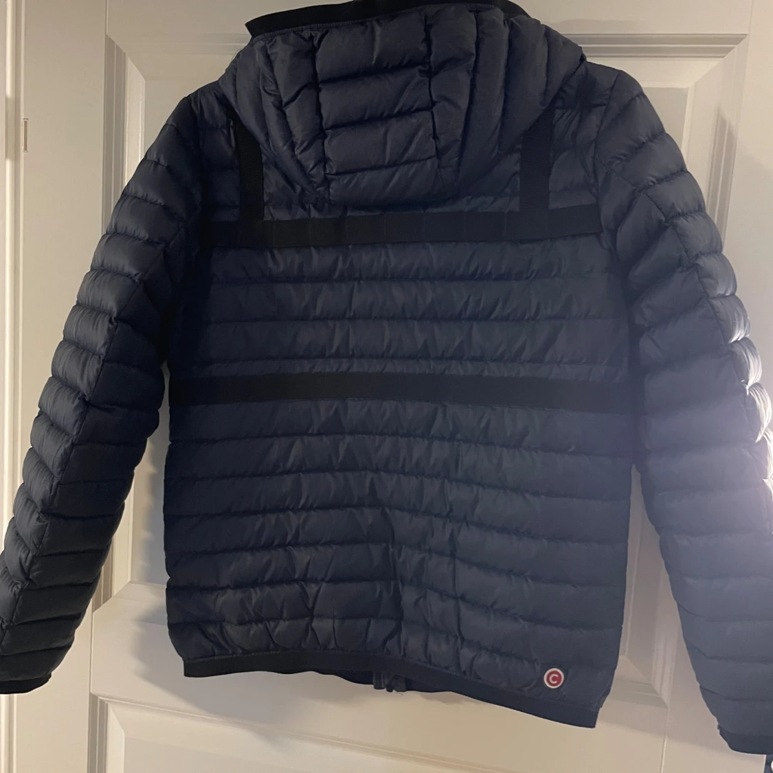 Mörkblå pufferjacka från Colmar - 1
