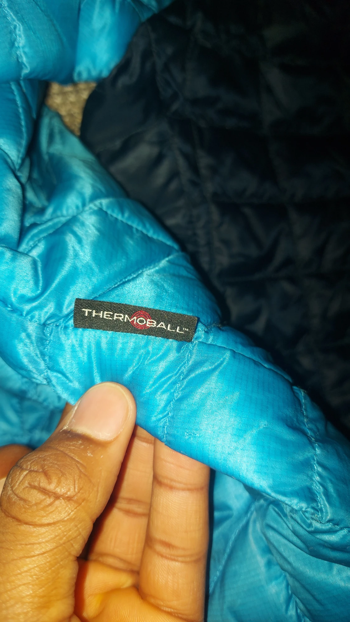 Blå och svart dunjacka från The North Face - 6