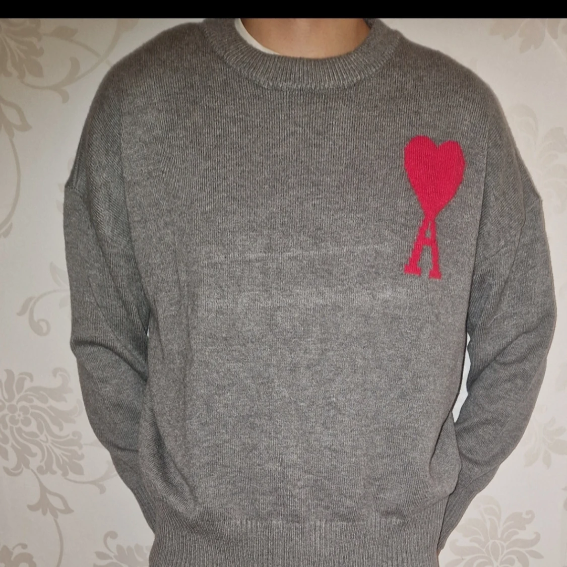 Grå stickad tröja från Ami Paris