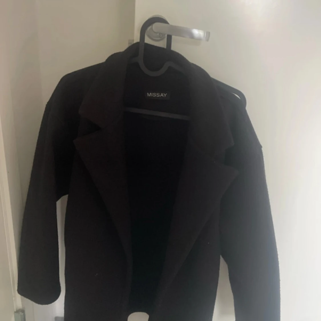 Svart kappa från Missay