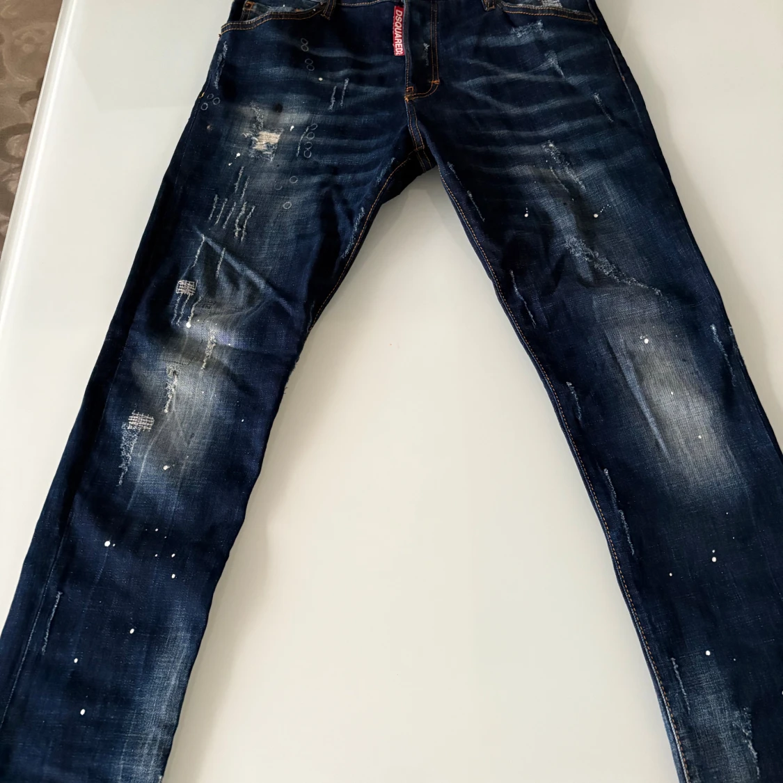 Dsquared2 blå jeans med slitningar