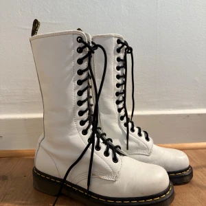 White leather doc martens - Vintage Doc Martens 10183 leather 14 Eyelet Zip Lace Up boots. Buttery soft leather, recently conditioned. The boots themselves are in great condition for their age. Minor scuffing on the toes and visible glue. For some reason the zipper protector on the inside is shedding, but it isn’t visible from the outside.   #drmartens #docmartens #combat #combatboots #goth #gothic #alt #alternative #y2k #grunge #vintage #retro #90s #90svintage #airwalk