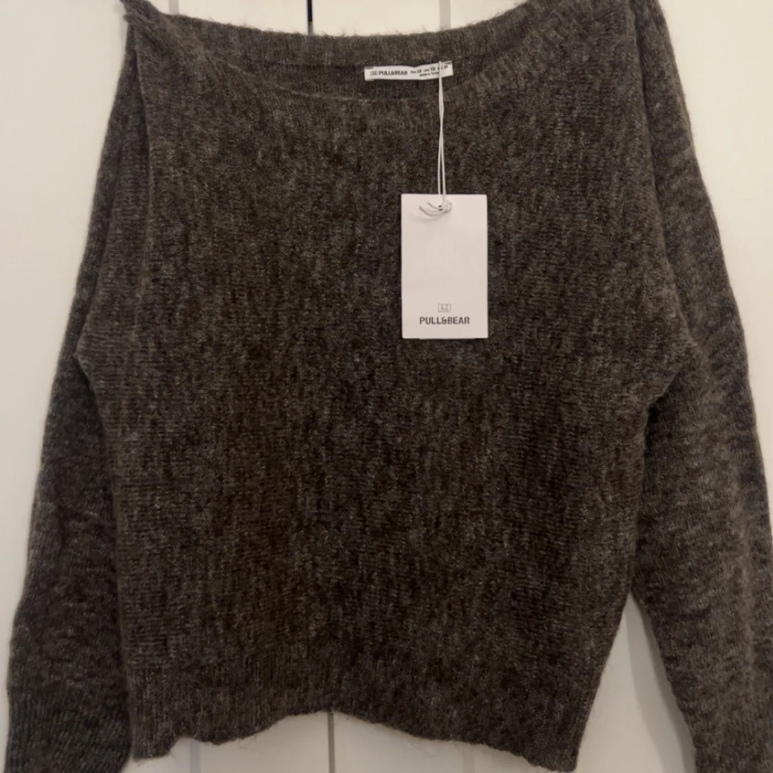 Brun stickad off-shoulder - 1