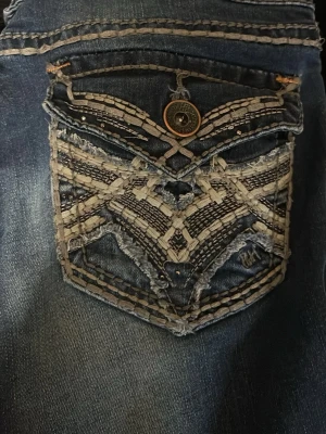 Jeans  - Låg midjade boot cut jeans.köpte dom för 1 500kr har ingen aning om märket!