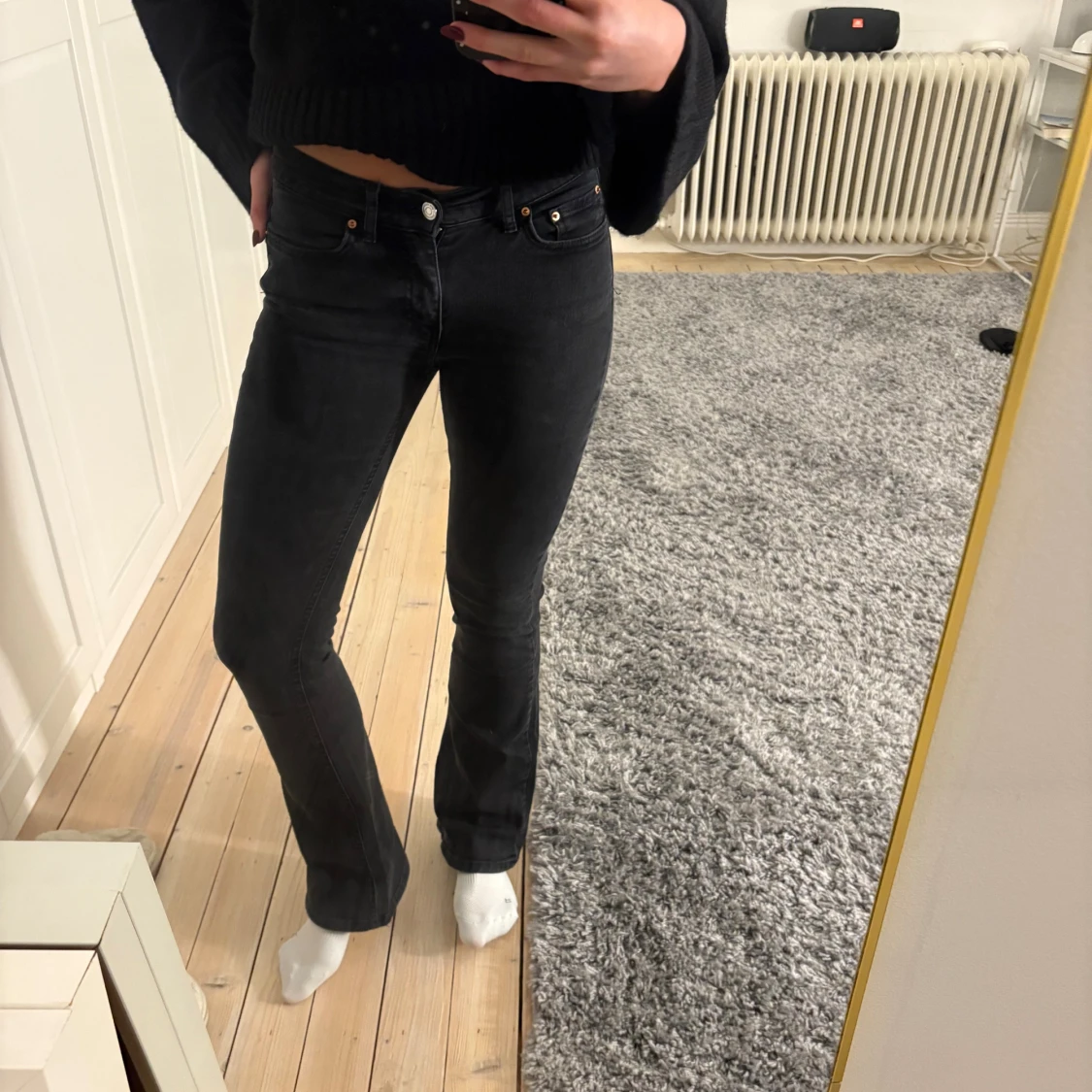 Svarta bootcut jeans med låg midja