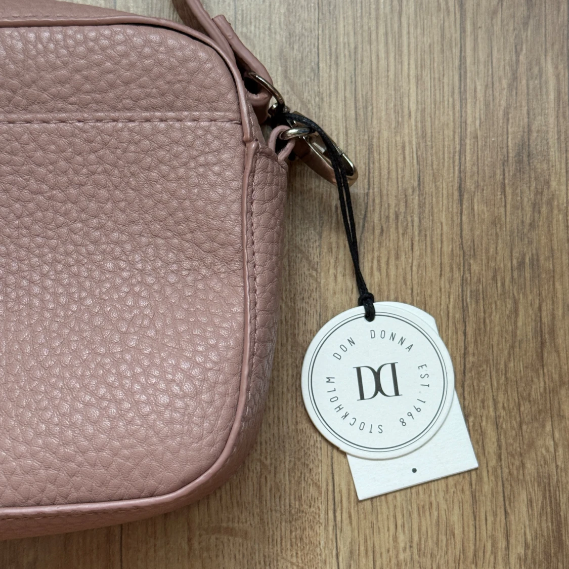 Rosa axelväska från Don Donna - 1