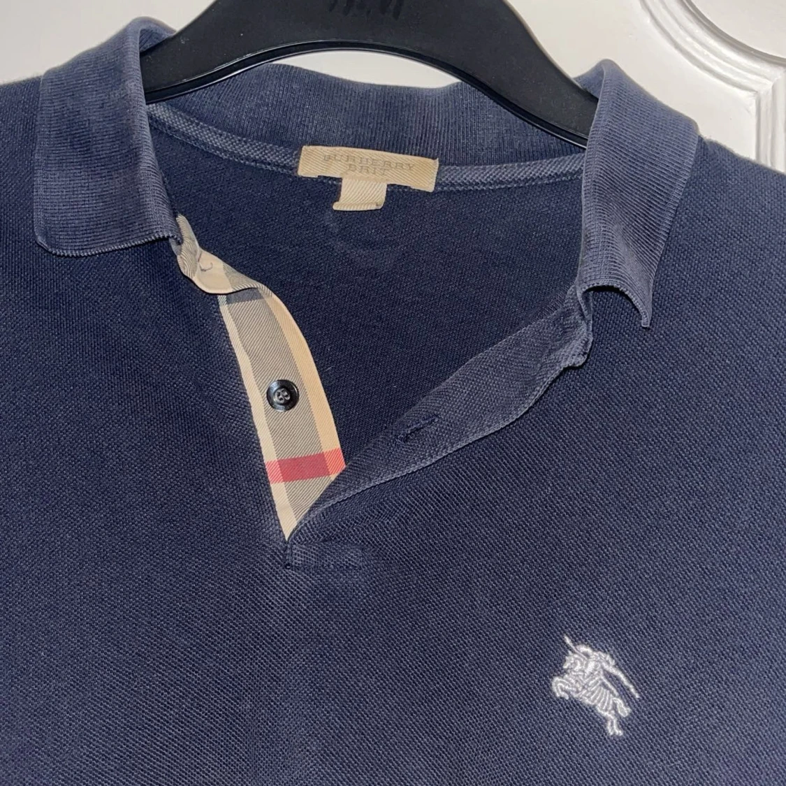 Mörkblå pikétröja från Burberry - 1