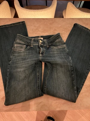 Lågmidjade jeans från Nelly  - Lågmidjade jeans i storleken 34. Går att buda!!