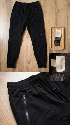 H&M Move Cargo Joggers – Men – Very good condition - Selling a pair of stylish and functional joggers from H&M Move. Perfect for training, outdoor activities, or as part of a casual everyday outfit (techwear). Details: Brand: H&M Move. Size: S (CN 175/80A). Color: Black. Material: Durable and stretchy functional fabric (94% polyamide, 6% elastane). The fabric is lightweight, flexible, and quick-drying.