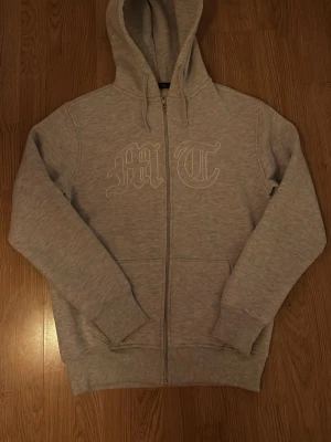 Tuttolente hoodie grå - Size L. Väldigt bra skick