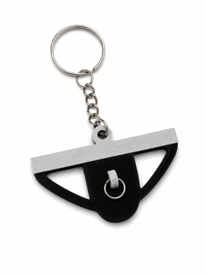 Jockstrap nyckelring  - Ge dina nycklar lite mer personlighet med denna unika jockstrap-inspirerade nyckelring! Perfekt för dig som gillar en lekfull design, pride, läder- och fetishkultur eller bara vill ha en rolig och annorlunda accessoar.