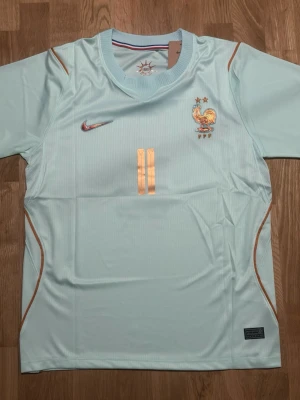 France Away Jersey 2026 World Cup Olise #11 – Size M - Stand out with the stunning France 2026 Away Jersey featuring Michael Olise #11 on the back. One of the cleanest international kits of the 2026 World Cup.  * 🇫🇷 France 2026 Away Jersey * ⭐ Michael Olise #11 * 📏 Size: Small (M) * ✅ Brand New * 💨 Lightweight & breathable material * 👕 Comfortable athletic fit * ⚽ Perfect for football fans, collectors, and casual wear  Don’t miss out on one of France’s most sought-after jerseys grab it before it’s gone!