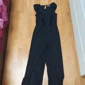 H&M jumpsuit  - H&M jumpuit with diamonds. Perfect for new years 