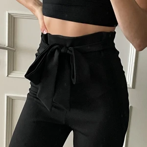 Byxor - Kostymbyxor från Nelly som aldrig kommit till användning  Frakt ingår 