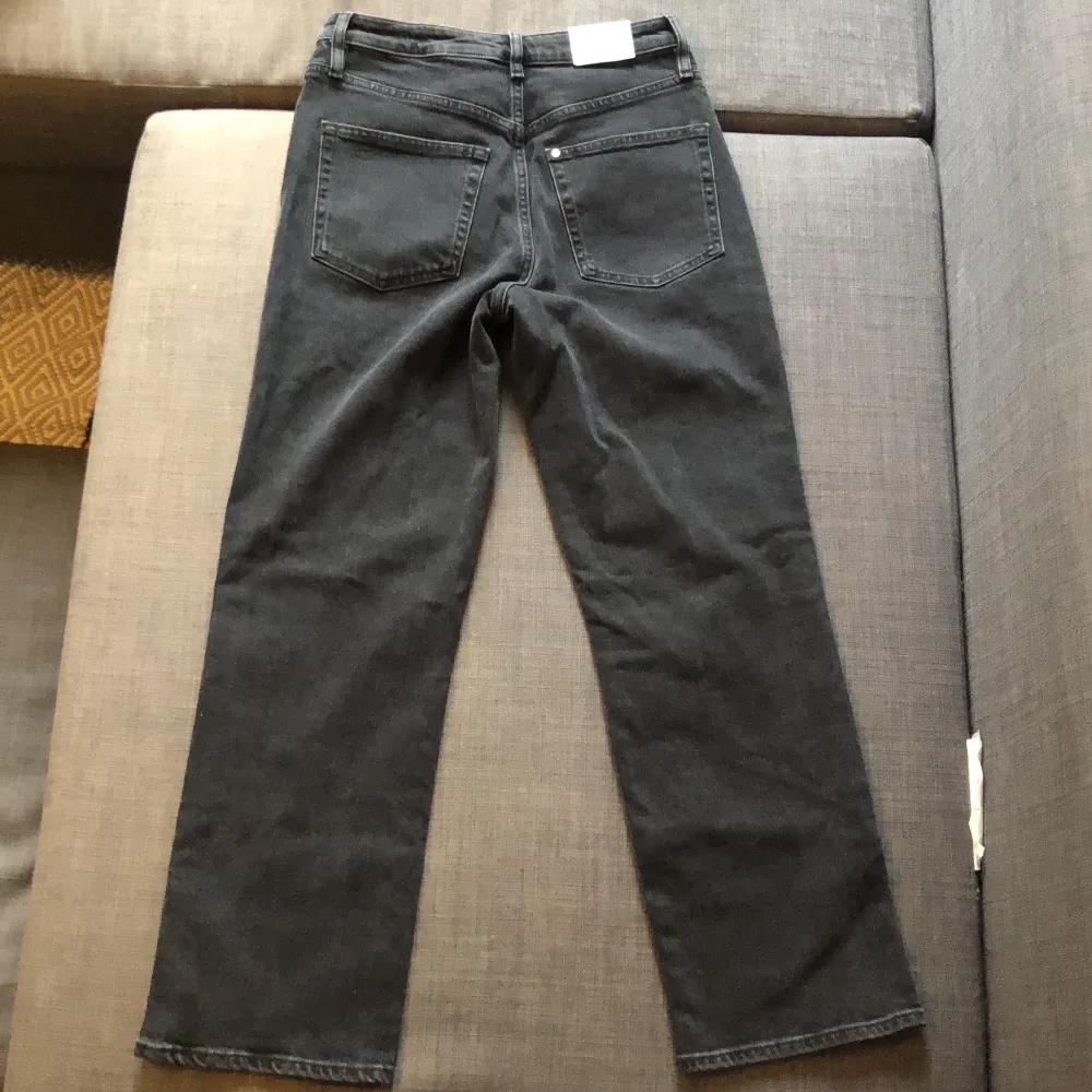 Grey distressed jeans from H&M, 3 buttons for the waist. Never worn, just want to get rid of it. There is a big cut out in one of the legs - these would make cute shorts if cut.. Jeans & Byxor.