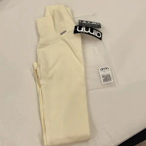 AIMIN SPORT TIGHTS - Högmidjade gräddvita tränings tights från aimin sportsweare. 