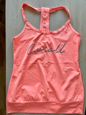 Casall training top - Size: 36 Condition: Excellent Colour: neon orange