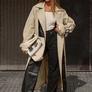 Trenchcoat with leather details - NA-KD. The perfect trenchcoat with leather details, long in both length and sleeves! Oversized fit. Size: Small. Worn a couple of times but looks as good as new! 🦋