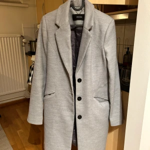 Kappa - Fin kappa som är väldigt sparsamt använd