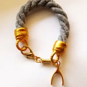 Handmade bracelet with the lucky element, grey and gold, new, 22cm length 