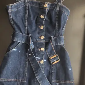 New (never been used) dark blue skirt overall jeans with buttons (they can be unbuttoned) with a belt (can be used separately)