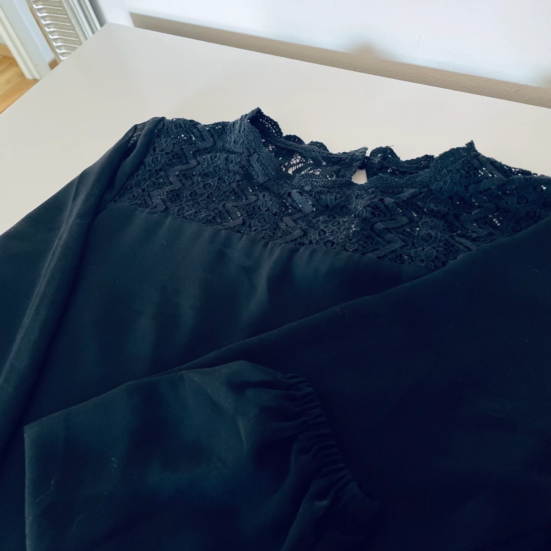 Svart blus i storlek 158