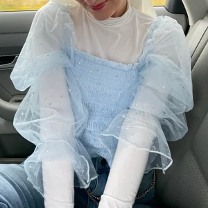 Girly sky blå skjorta från bik bok  - Den är L, men passar M. Glittrig.