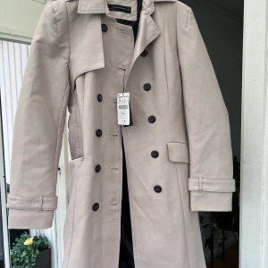 Zara kappa  - Storlek L 