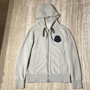 Moncler Zipped Hoodie - Moncler Maglia Hooded Cardigan/Zipped Hoodie(L/ fits M-L)(Grey)(All Navy Logo) Condition:like new Retail:5500kr