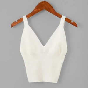 Benvit stickad topp - Världens skönaste material, väldigt stretchigt. Endast provad