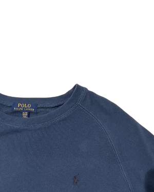 Ralph Lauren Cotton blend sweatshirt i blå och i fint skick. Är i storlek XL kids (169-174cm). Denna är lätt begagnad. 