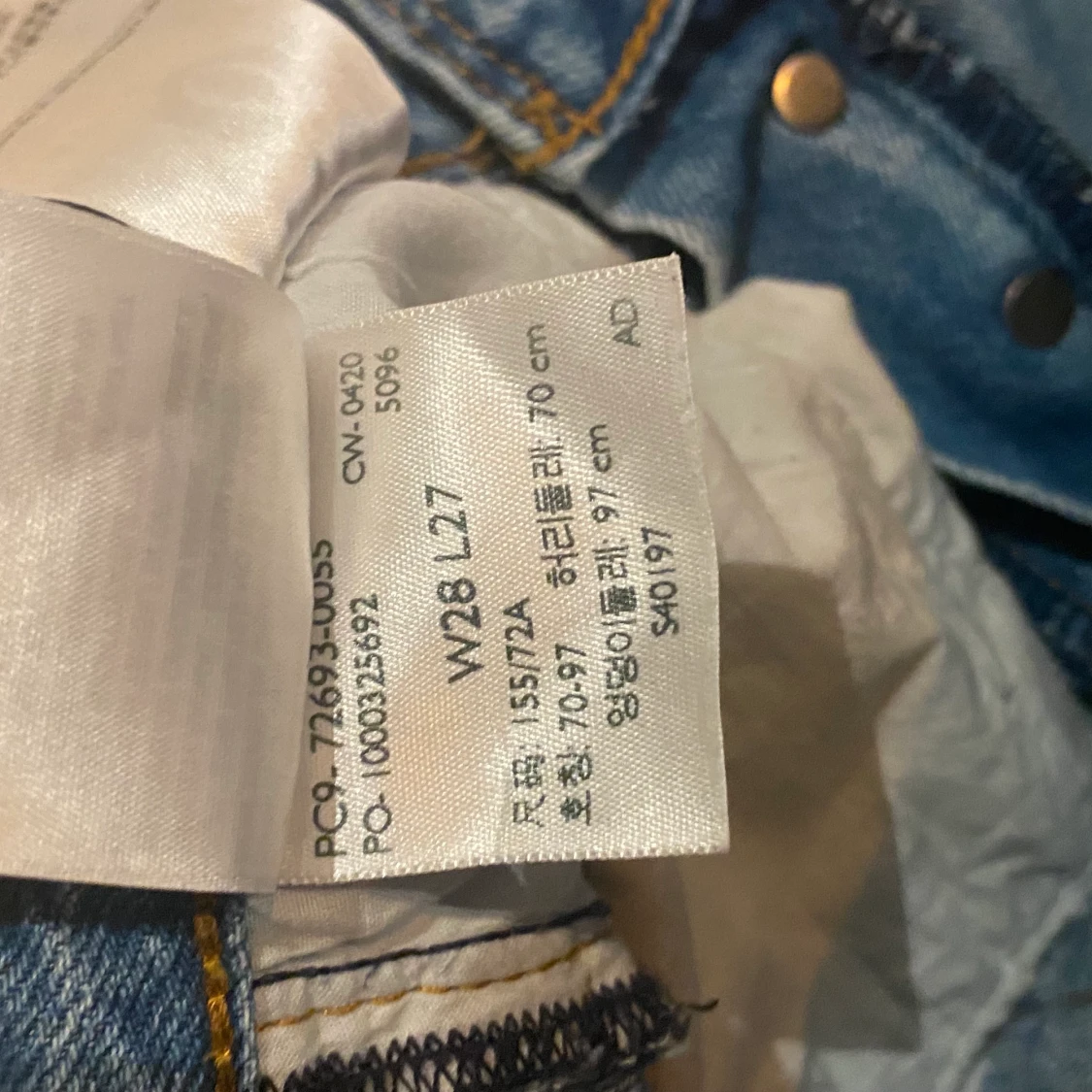 Ett par blåa Levi’s Jeans - 91