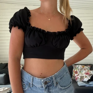 Topp - Svart topp från Nelly 