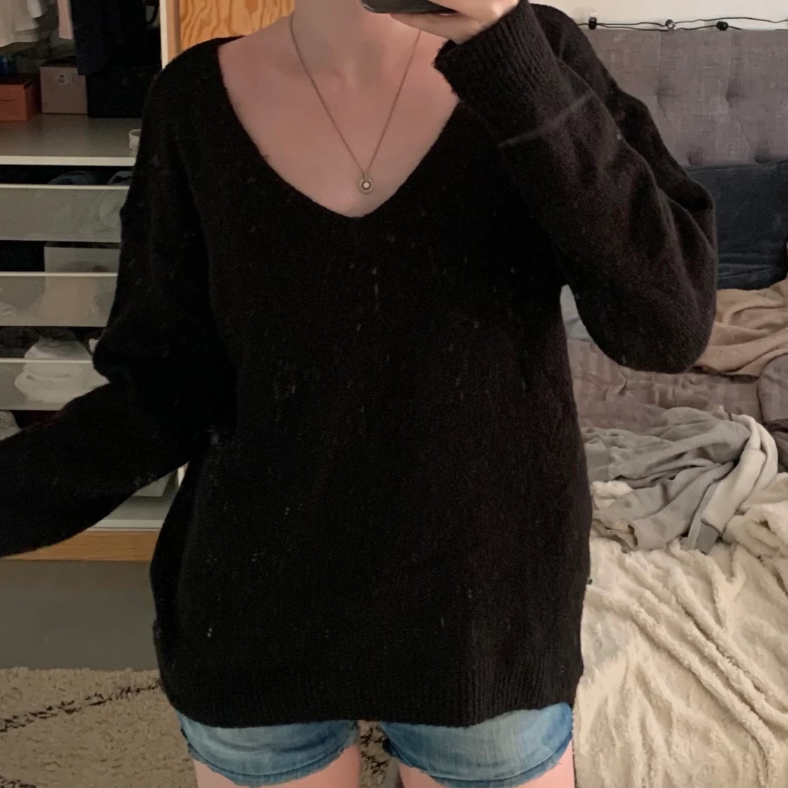 Svart stickad tröja