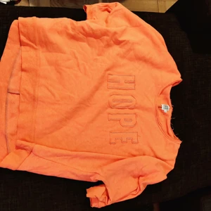 Tjocktröja orange - Tränings overshirt/tjocktröja med texten HOPE på