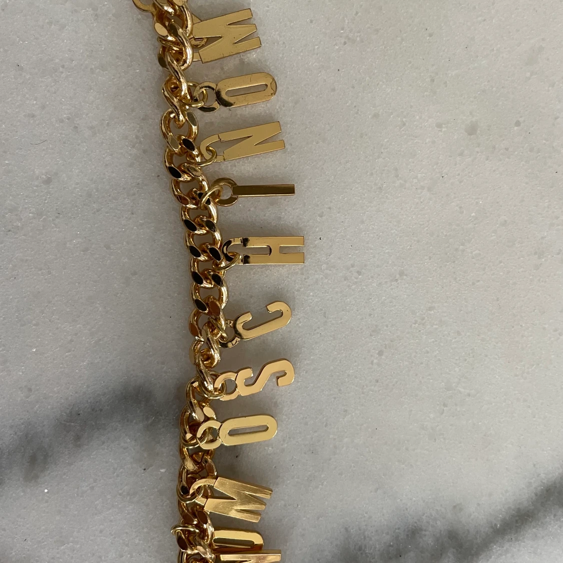 Moschino armband / halsband  - 90