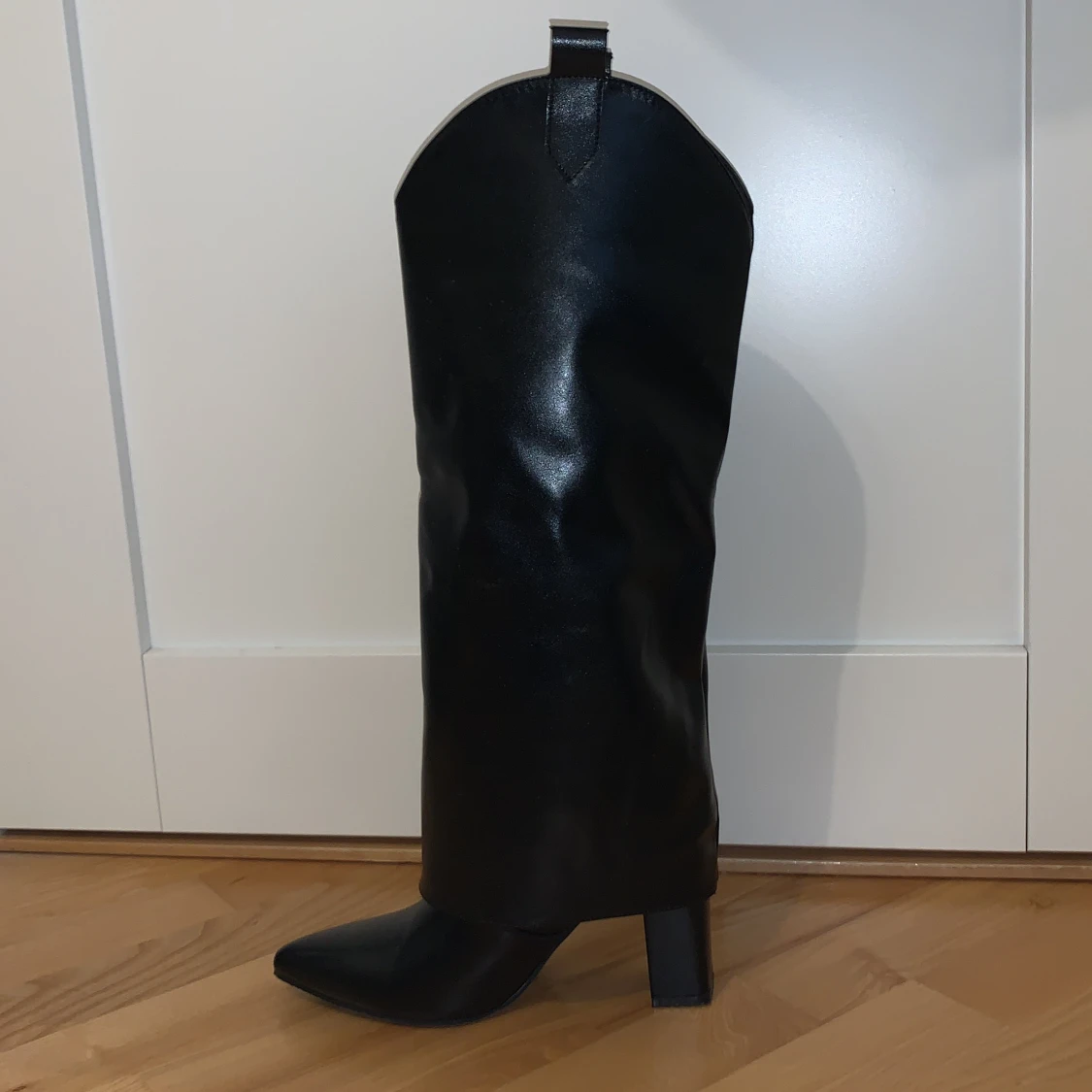 Svarta stövlar - 91