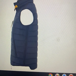 Parajumper - En blå parajumper väst använd några gånger inga fel med den inga hål eller något i gott skick.