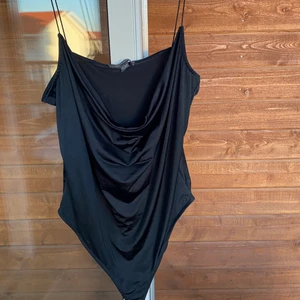 Body  - Body från primark i storlek Xl men passar både större och mindre. Snygg framtida och skönt material. Aldrig använd. 