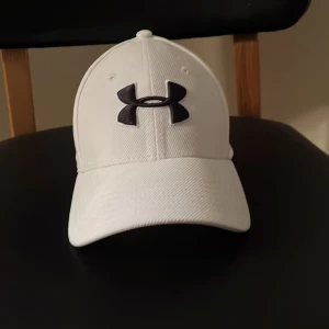 Under armour keps  - En helt oanvänd under armour keps 