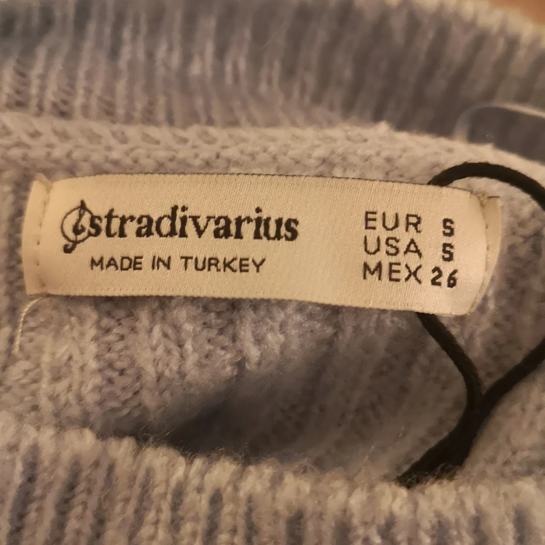 Blå stickad tröja - 90